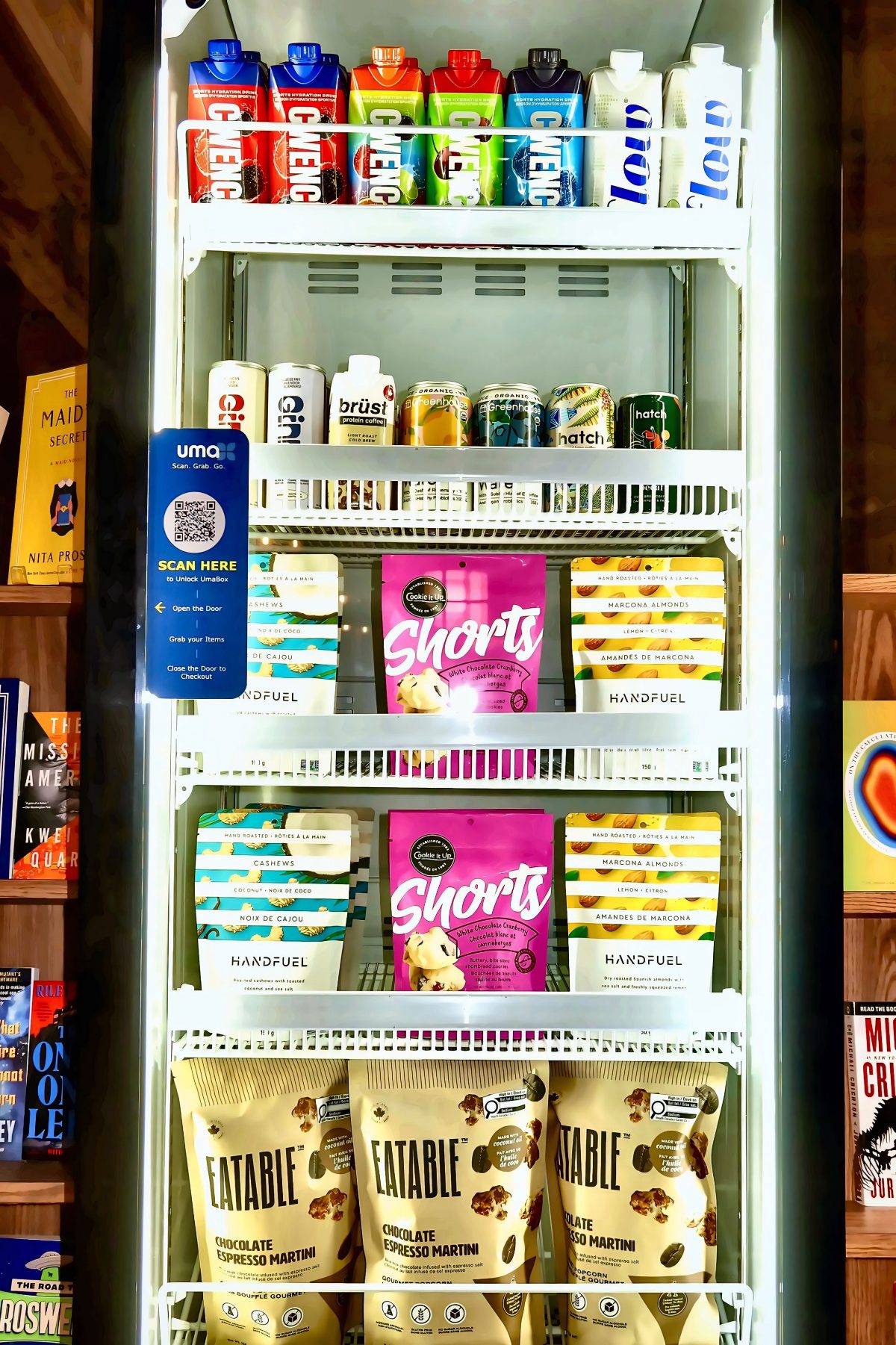 Interior shelves of the Uma cabinet stocked with snacks and ready-to-eat items